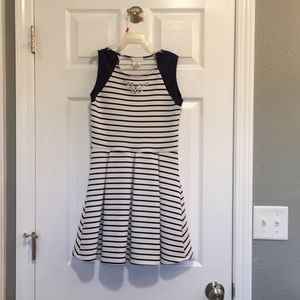 Classic navy and white striped dress with pleats